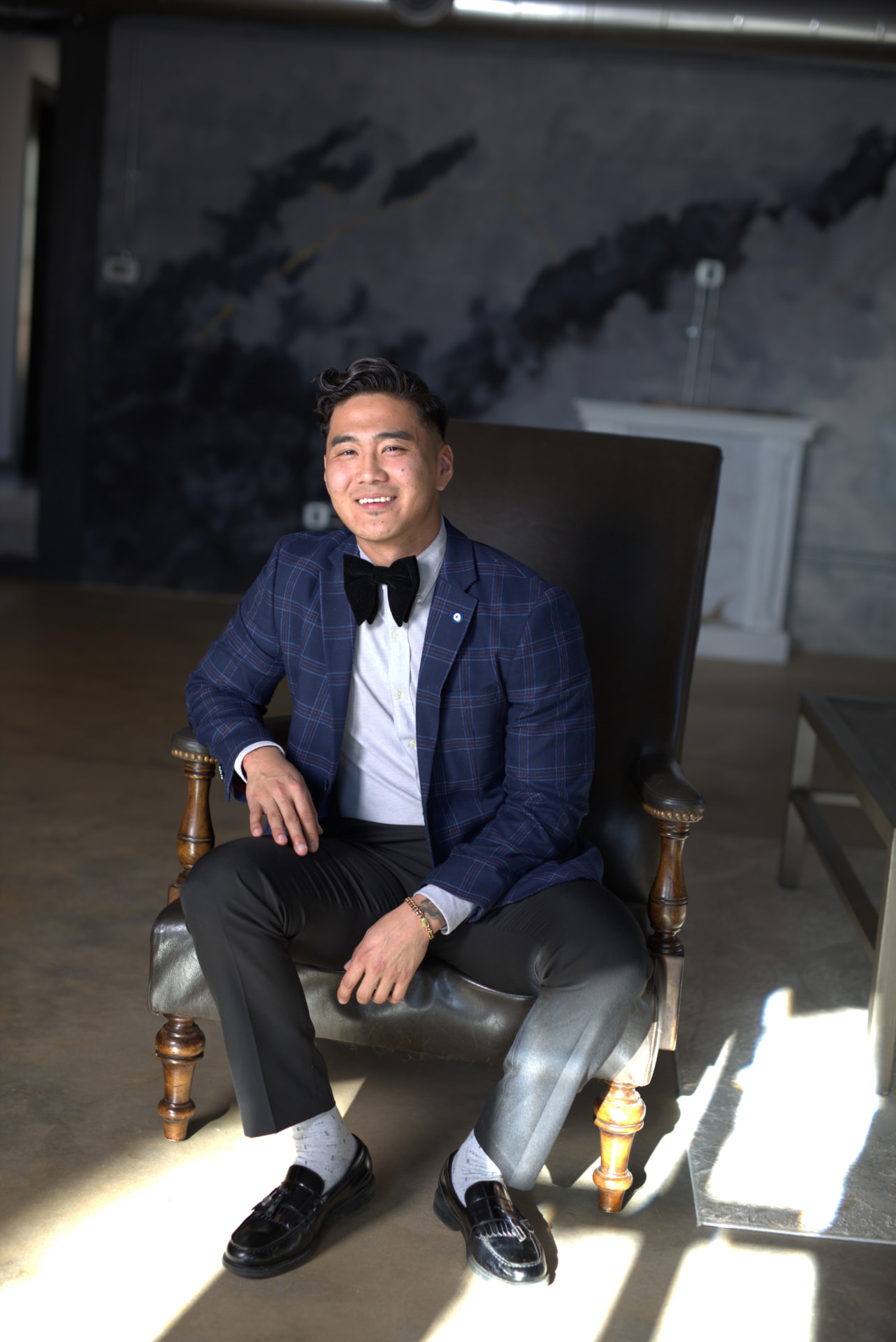 Tim Guercio seated, portrait